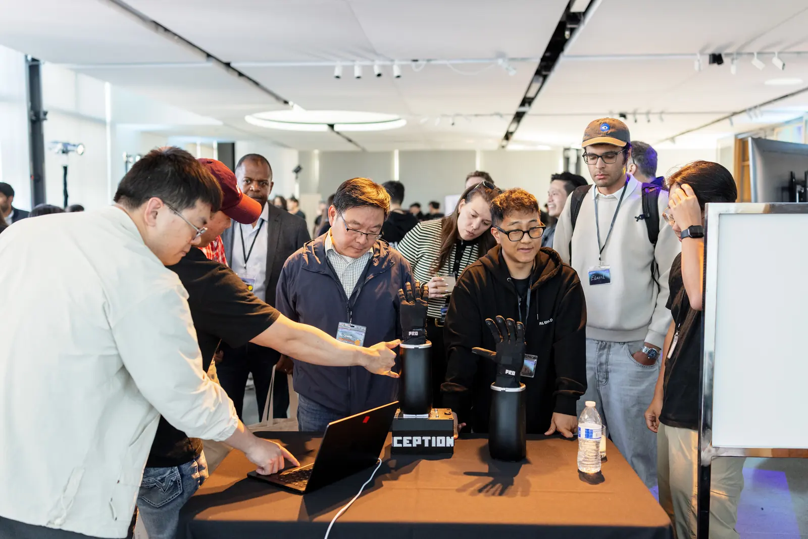 Guests hands-on at the robot demo table