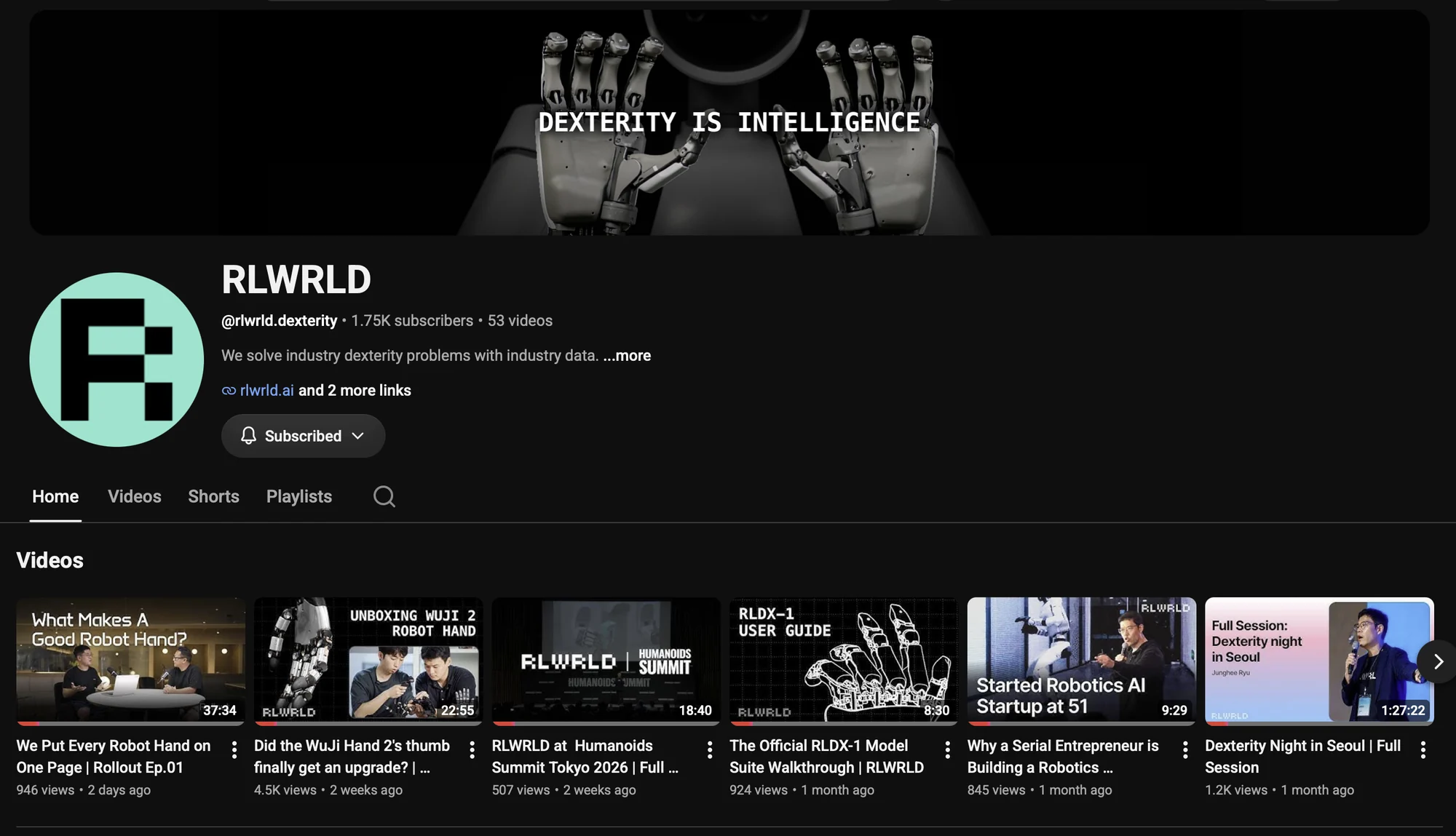RLWRLD YouTube channel home after the redesign: banner, avatar and the current video row sharing one system